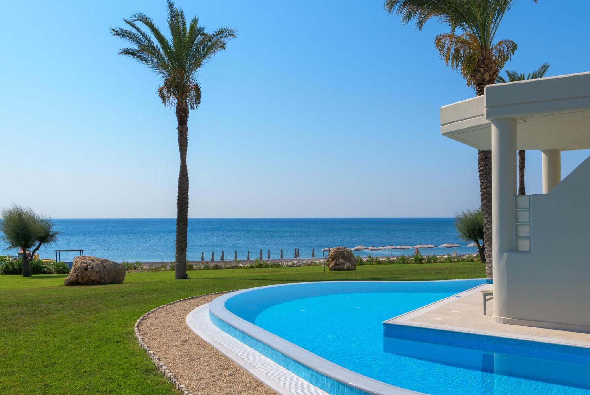 Rodos Palladium Leisure&Wellness Kallithéa Esterno foto A swimming pool in Cyprus