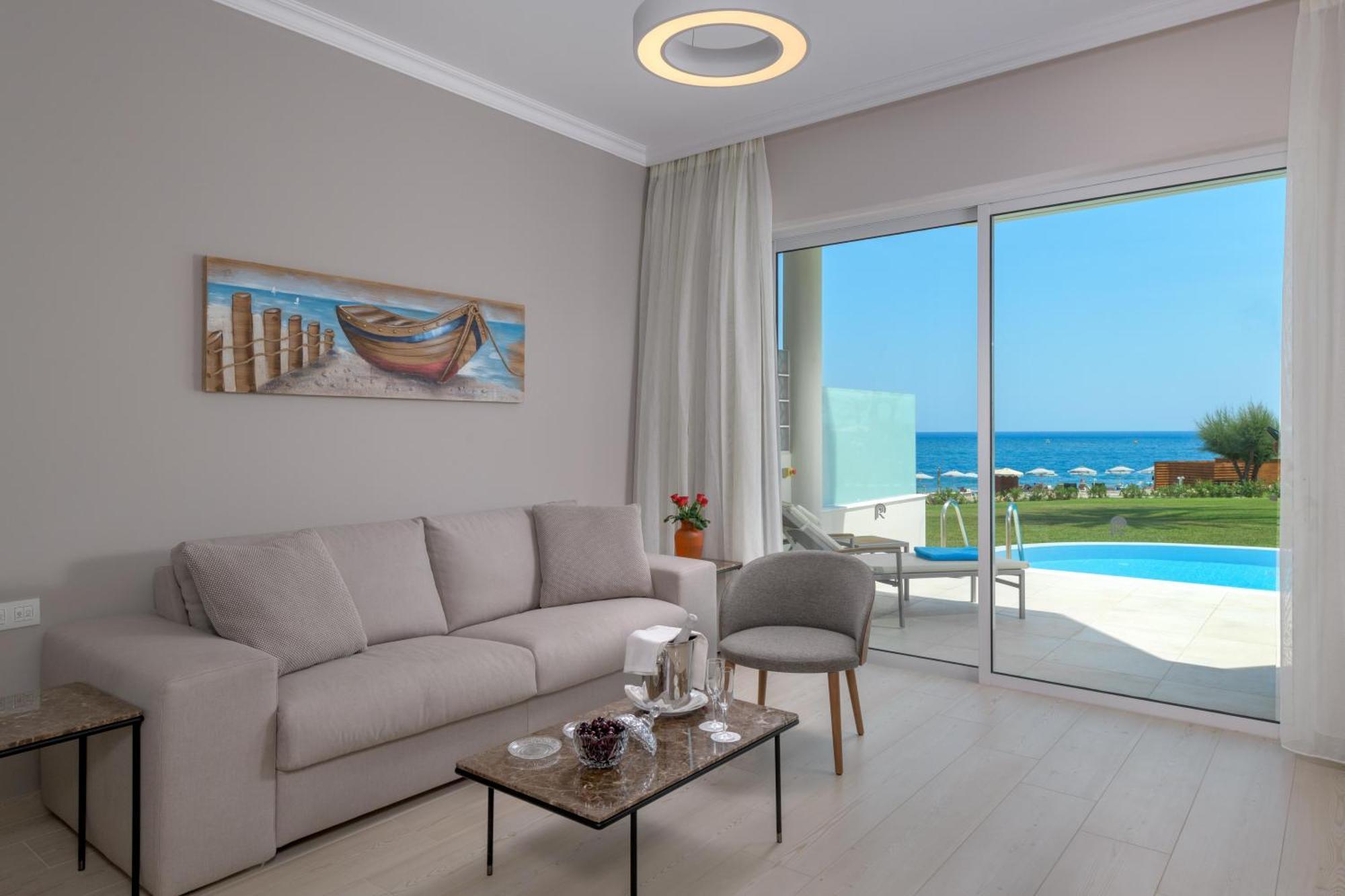 Rodos Palladium Leisure&Wellness Kallithéa Esterno foto A living room with a view of the sea